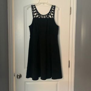 Lane Bryant Size 14 Black Fit and flare dress with ladder cut out.